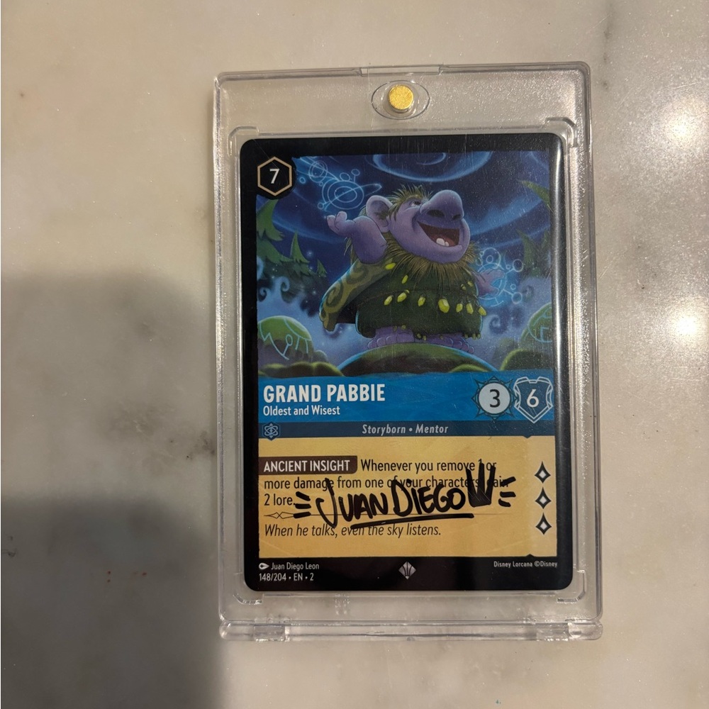 Disney Lorcana - Grand Pabbie Card signed by the Artist Juan Diego